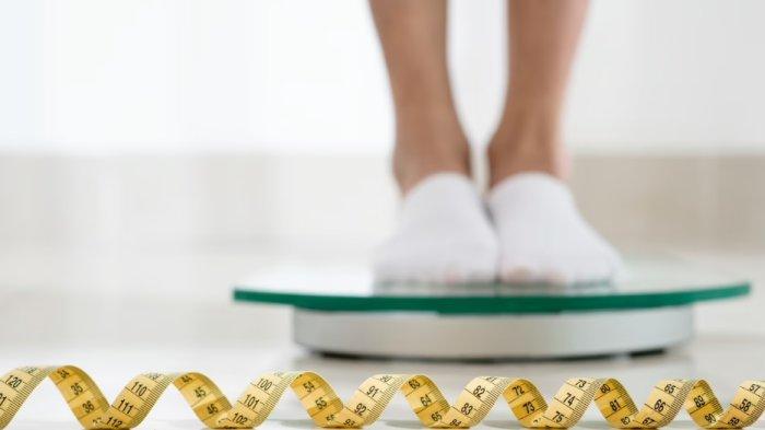 Ilustrasi menurunkan berat badan.