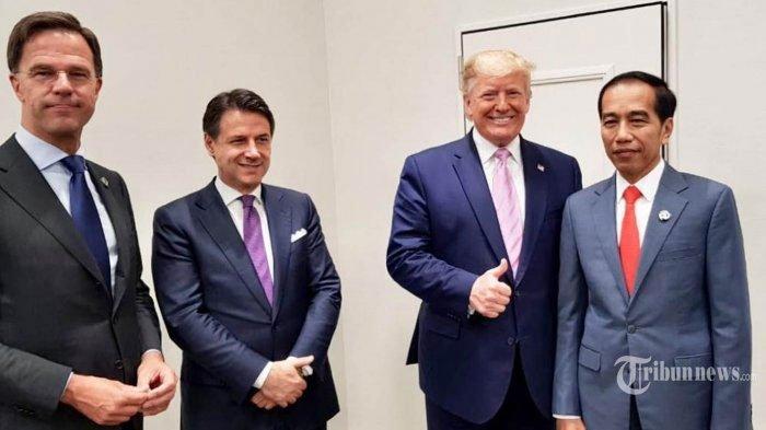 Presiden Jokowi berfoto dengan Presiden AS Donald Trump dan para pemimpin dunia yang tengah mengikuti Konferensi Tingkat Tinggi (KTT) G20 di Jepang, Jumat (28/6/2019).