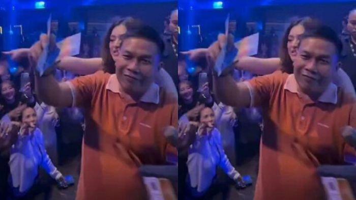 KADES KETAHUAN SAWERAN - Tangkapan layar video yang merekam momen kepala desa di Cirebon, Jawa Barat, saweran di klub malam. Kini dia klarifikasi sumber uang yang dipakai untuk menyawer.