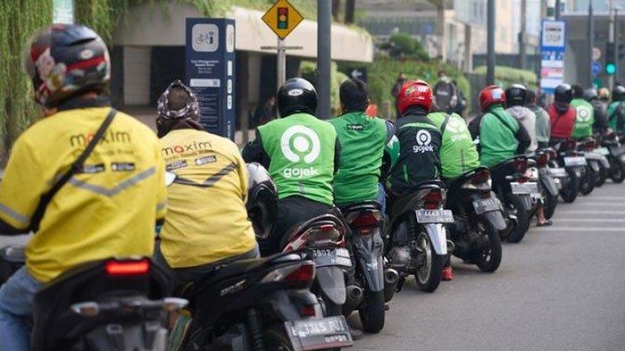 THR OJOL - Ilustrasi ojek online. Pemerintah pastikan pengemudi ojol dan kurir online akan mendapat THR atau bonus hari raya 2025, Senin (10/3/2025).