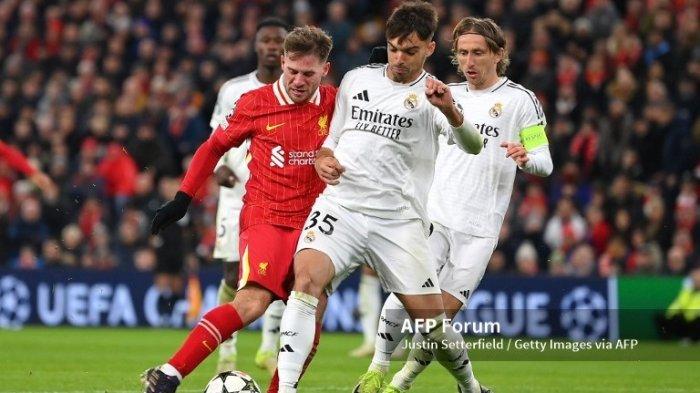 Alexis Mac Allister vs Raul Asencio di Liga Champions antara Liverpool vs Real Madrid di Anfield, 27 November 2024