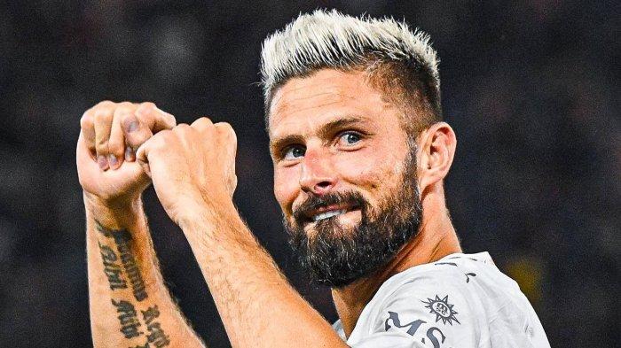 Selebrasi penyerang AC Milan, Olivier Giroud usai mencetak gol ke gawang Bologna pada laga perdana Serie A 2023/24 di Stadion Renato Dall'Ara, Senin (21/8/2023) waktu setempat atau Selasa dini hari WIB.
