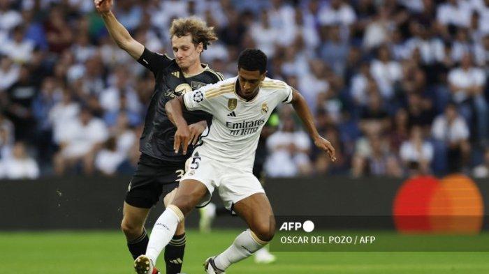 Jude Bellingham vs Alex Kral di Liga Champions antara Real Madrid vs Union Berlin di stadion Santiago Bernabeu di Madrid pada 20 September 2023.
