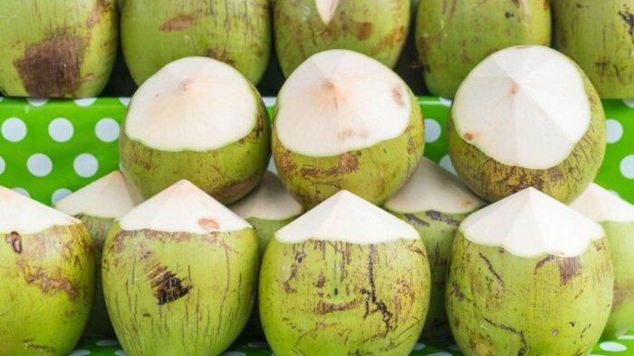 Fresh coconuts on shelf