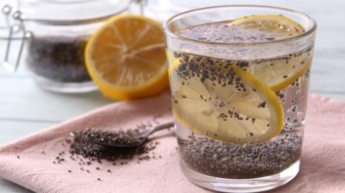 Water with chia seeds on the table closeup food supplement superfood