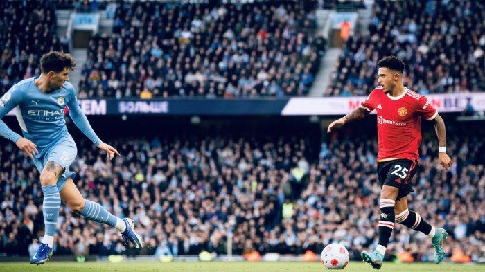 Aksi Jadon Sancho saat tampil menghadapi Manchester City di Stadion Etihad, Minggu (6/3/2022) lalu.
