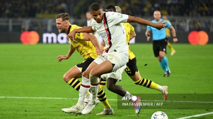Niclas Fuellkrug vs Malick Thiaw di Liga Champions antara Borussia Dortmund vs AC Milan di Dortmund, Jerman bagian barat pada 4 Oktober. 2023.