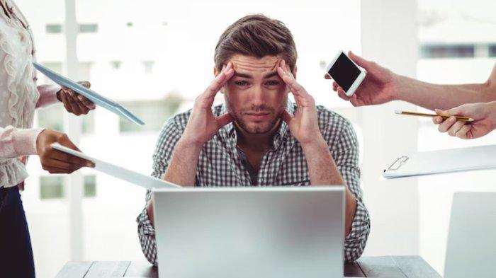 Businessman stressed out at work