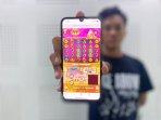 Ilustrasi-Tampilan-layar-judi-online-slot.jpg