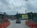 Kendaraan-melintas-exit-tol-Tamanmartani.jpg