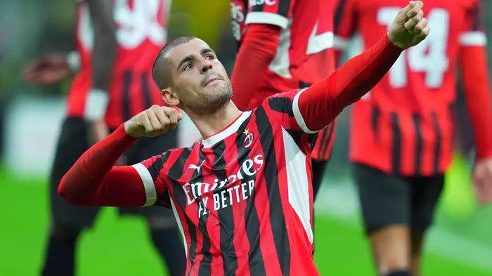 Selebrasi Alvaro Morata ketika mencetak gol pada pertandingan AC Milan vs Lecce di Stadion San Siro, Sabtu (28/9/2024).
