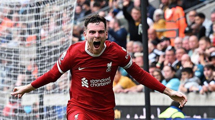 Andy Robertson saat merayakan gol ke gawang Wolves, Liverpool berhasil menang 1-3 atas tuan rumah