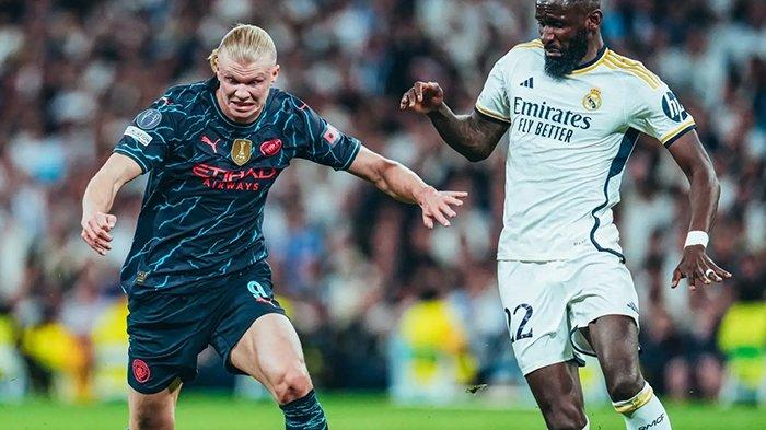 Duel bek Real Madrid, Antonio Ruediger dan penyerang Manchester City, Erling Haaland pada pertandingan perempat final Liga Champions leg 1, di Stadion Santiago Bernabeu, Rabu (10/4/2024).