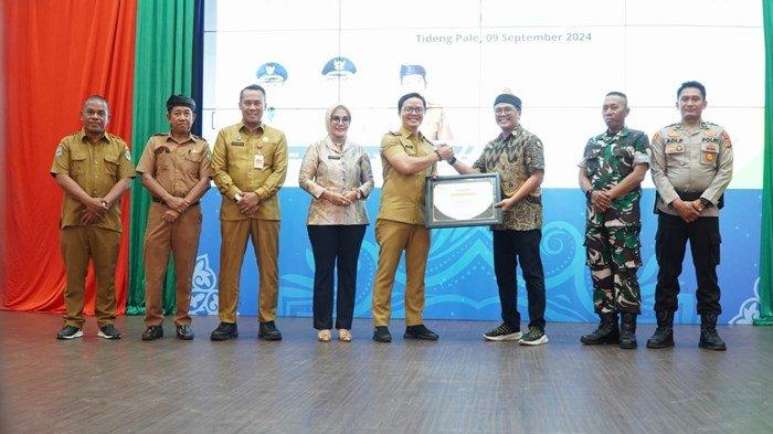 Bupati Tana Tidung, Ibrahim Ali Saat Membuka Launching Jamsostek untuk Pekerja Rentan, Senin (9/9/2024). (ISTIMEWA)
