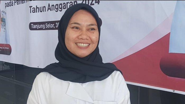 CAT CALON PPPK – Dika (peserta) CAT saat diwawancarai dan mengatakan perasaan gugup tetap ada meskipun peluang lolos menjadi ASN tinggi (TribunKaltara.com / Desi Kartika Ayu Nuryana)