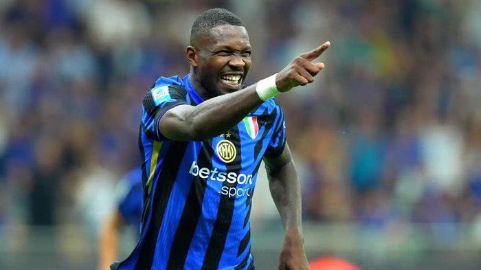 Selebrasi penyerang Inter Milan, Marcus Thuram saat mencetak gol ke gawang Atalanta, pada giornata 3 Liga Italia Serie A, di Stadion Giuseppe Meazza, Sabtu (31/8/2024).