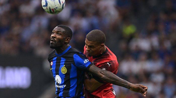Duel Marcus Thuram dan Malick Thiaw pada laga Derby della Madonnina Inter Milan vs AC Milan, giornata 4 Liga Italia Serie A, di Stadion Giuseppe Meazza, Minggu (17/9/2023). (Twitter / @inter)