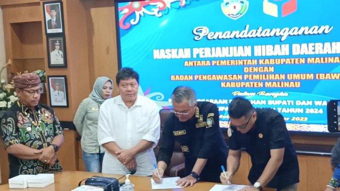 Bupati Malinau, Wempi W Mawa saat menandatangani NPHD Pilkada 2024 bersama KPU dan Bawaslu di Kantor Bupati Malinau, Kalimantan Utara, Jumat (3/10/2023).