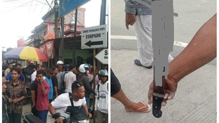 Suasana keramaian di kawasan Karang Joang saat warga berupaya mengamankan pelaku. Sebilah parang yang digunakan pria tak dikenal tersebut saat mengamuk