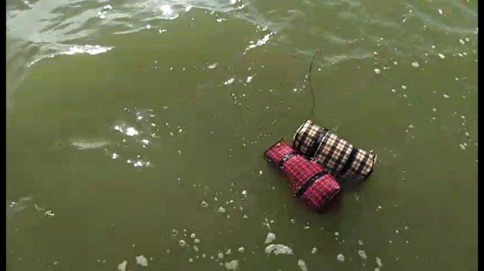 Proses dan upaya tim gabungan mengamankan BB 15,3 kg sabu-sabu yang hendak dibuang ke laut oleh pelaku kurir dan berhasil ditangkap. Dokumentasi Tim Gabungan BNNP Kaltara, Bea Cukai Tarakan dan Satrol Lantamal XIII Tarakan