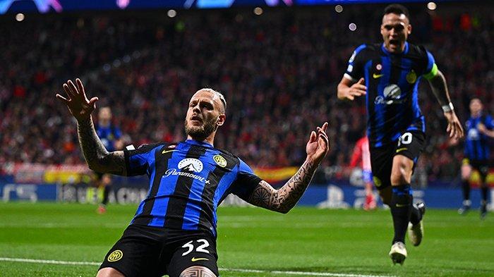 Selebrasi Federico Dimarco ketika mencetak gol pada pertandingan Atletico vs Inter Milan, babak 16 besar Liga Champions, di Civitas Metropolitano, Kamis (14/3/2024).