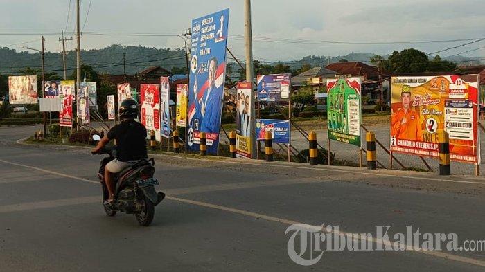 Alat Peraga Kampanye Pemilu 2024 yang terpasang di ruas jalan Kabupaten Malinau, Kalimantan Utara. (TribunKaltara.com/Mohamad Supri)