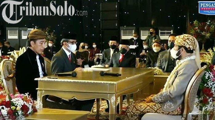 Pasangan Idayati dan Ketua MK Anwar Usman resmi menjadi sepasang suami istri. Presiden Jokowi bertindak secara langsung sebagai wali nikah untuk adik kandungnya. (TribunSolo.com/Tara Wahyu)