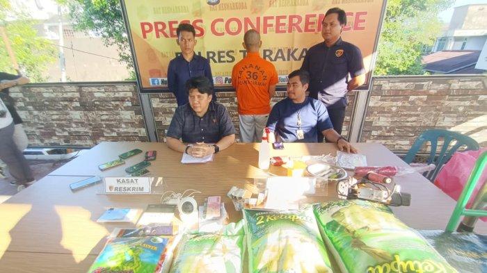 Kasat Reskrim Polres Tarakan didampingi jajaran saat menampilkan pelaku dalam rilis pers beras premium oplosan sore tadi, Selasa (11/6/2024). TRIBUNKALTARA.COM/ANDI PAUSIAH