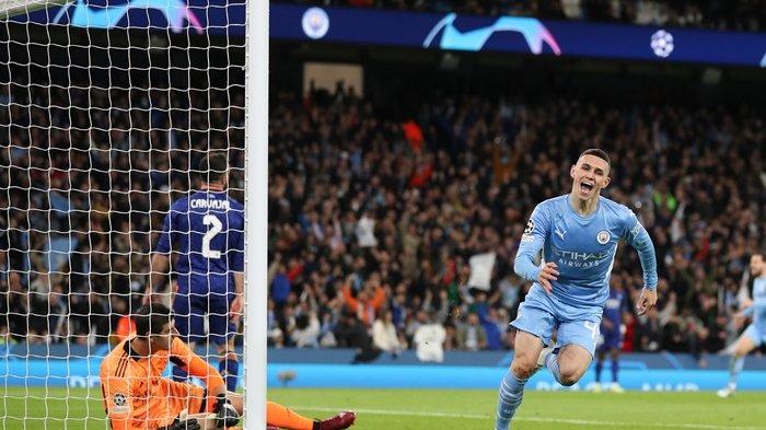 Selebrasi pemain Man City, Phil Foden usai menjebol gawang Real Madrid di menit 53.