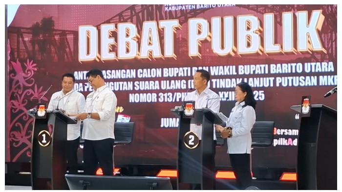 DEBAT PUBLIK PILKADA - Kedua paslon peserta Pilkada Barito Utara mengikuti debat publik, Jumat (25/7/2025).