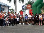 Peringati HUT ke-78 Bhayangkara, Polres Kobar Gelar Fun Run Diikuti Ribuan Masyarakat