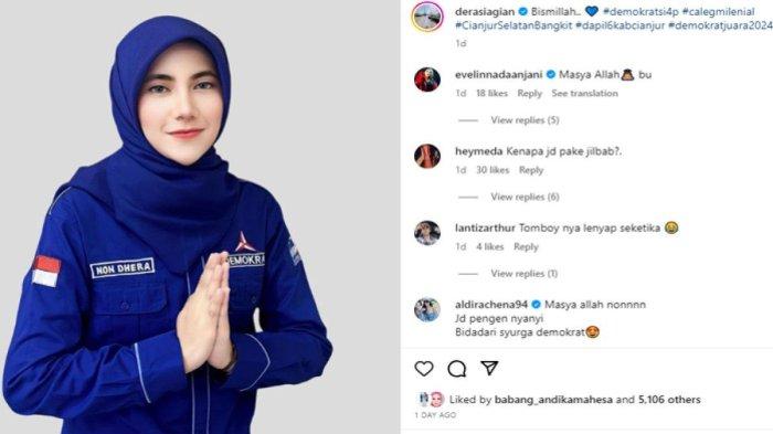 Dera Siagian cantik kenakan hijab dan baju kader partai Demokrat.