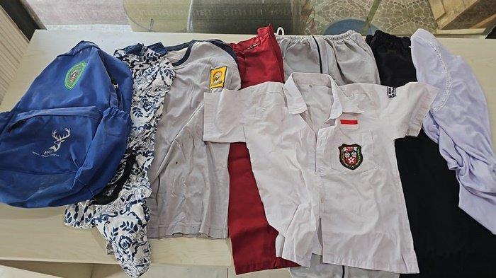 Barang bukti seragam sekolah dalam kasus korupsi bantuan pendidikan di Penajam Paser Utara. Subdit III Tipidkor Ditreskrimsus Polda Kaltim membongkar kasus dugaan korupsi pengadaan bantuan pendidikan di Kabupaten PPU senilai Rp 12 miliar. Tiga orang ditetapkan tersangka dalam kasus tindak pidana korupsi ini.