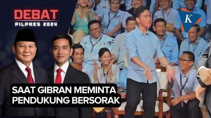 Calon wakil presiden (cawapres) nomor urut 2 Gibran Rakabuming Raka, memberi gestur ajakan sorak-sorai saat calon presiden pendampingnya, Prabowo Subianto, melayani debat dengan capres nomor urut 1, Anies Baswedan, dalam dalam debat capres di kantor KPU, Jakarta, Selasa (12/12/2023). - KPU bakal menegur Gibran karena aksinya yaNg menjadi pemandu sorak-sorai pendukung usai mendengar jawaban Prabowo yang ditanya Anies soal putusan MK.