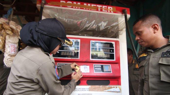 RAZIA POM MINI - Secara resmi pihak Pemkot Balikpapan melalui Satpol PP dan tim gabungan melakukan penertiban keberadaan Pom Mini BBM yang ada di area terlarang, Kamis (25/4/2024) pagi. 