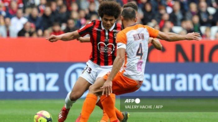 INDONESIA VS GUINEA - Lamine Diaby-Fadiga (pemain Nice) saat berebut bola dengan Vitorino Hilton (pemain Montpellier) Kabar buruk bagi Guinea. Striker andalannya, Lamine Diaby-Fadiga diperkirakan absen di laga playoff Olimpiade melawan Timnas Indonesia. Laga Indonesia vs Guinea akan digelar Kamis (9/5/2024) nanti.