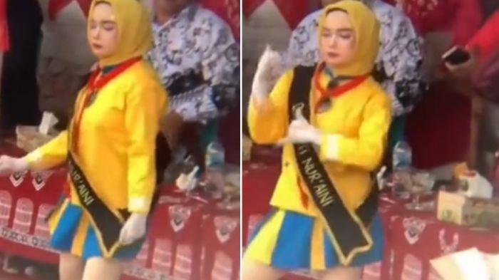 MAYORET BERJILBAB VIRAL - Video viral memperlihatkan mayoret berjilbab menggunakan rok mini sambil berjoget.