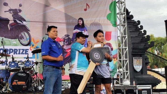 Wildan Praya Pamungkas, pemenang undian grandprizes Yamaha Geber Cilacap.