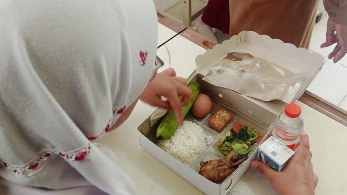 Uji Coba pelaksanaan Program Makan Bergizi Gratis (MBG) di Kabupaten Kutai Kartanegara (Kukar), Kalimantan Timur.