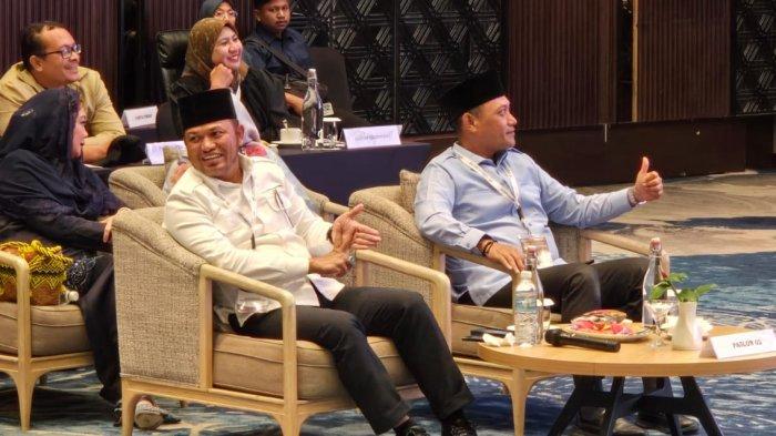 PEMENANG PILKADA KALTIM - KPU kaltim menggelar rapat pleno terbuka dengan agenda penetapan pasangan calon Gubernur dan Wakil Gubernur Kalimantan Timur (Kaltim), bertempat di Crystal Ballroom Hotel Mercure, Jalan Mulawarman, Kota Samarinda, Kamis (6/2/2025) malam. (Tribunkaltim.co/Mohammad Fairoussaniy)