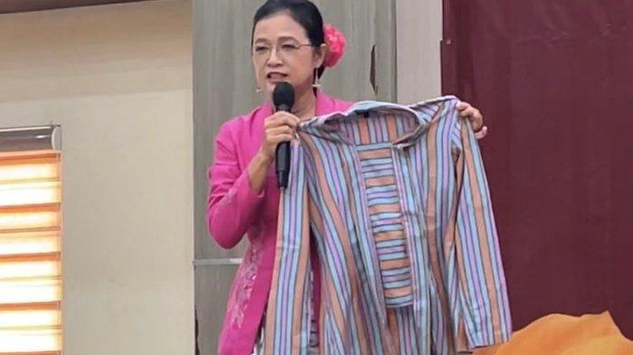 KEBAYA KUTUBARU - Ketua PBI Bogor, Sita menjelaskan Kebaya Kutubaru identik dengan bef di bagian dada. (KOMPAS.com/DEVI PATTRICIA)