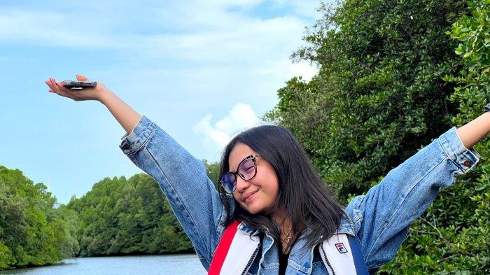 Keseruan Jeje menikmati keindahan Hutan Mangrove Kota Balikpapan saat Cuti Bersama Idul Adha 2023.TRIBUNKALTIM.CO/HO