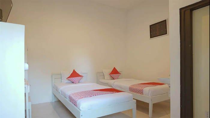 PENGINAPAN -- Fasilitas ranjang di Cajoma Guesthouse & Villa