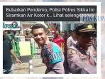Viral-Polisi-Siram-Pendemo-dengan-Air-Sambil-Senyum.jpg