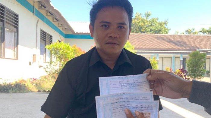 Calon PMI asal Lombok Timur, Irwan Fathony gagal berangkat ke Taiwan meskipun sudah bayar Rp 120 juta. Irwan memperlihatkan bukti kuitansi.