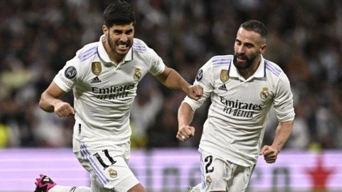 Gelandang Real Madrid, Marco Asensio (kiri)  selebrasi setelah mencetak gol kedua timnya ke gawang Chelsea dalam pertandingan leg kedua perempat final Liga Champions 2022-23 di Stadion Santiago Bernabeu, Madrid, Rabu (12/4/2023) atau Kamis dini hari WIB. Real Madrid menang 2-0.