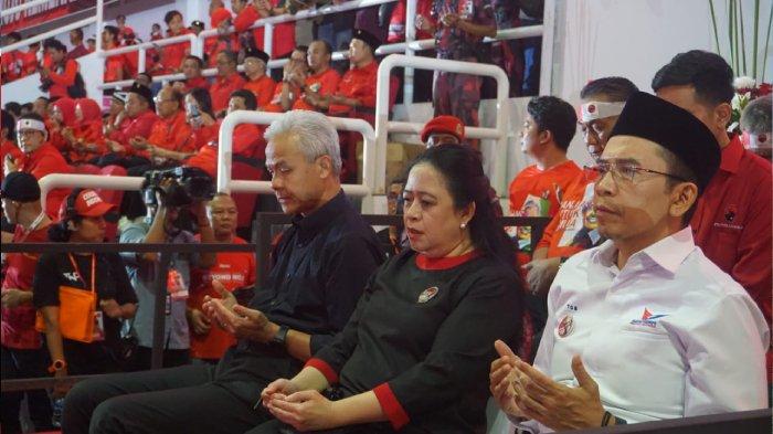 Ketua Harian Partai Perindo TGB HM Zainul Majdi bersama Calon Presiden PDIP Ganjar Pranowo saat hadiri acara konsolidasi PDIP, di Stadion Jatidiri Semarang, Jumat (25/8/2023).