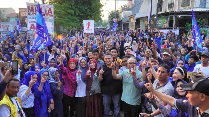 Appi-Aliyah bersama Fatmawati Wahyuddin dan ribuan loyalis berkumpul di Kelurahan Kalukuang, Kecamatan Tallo, Kota Makassar, Sabtu (19/10/2024).