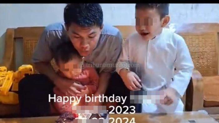 Praka Izroi bersama dua anaknya.