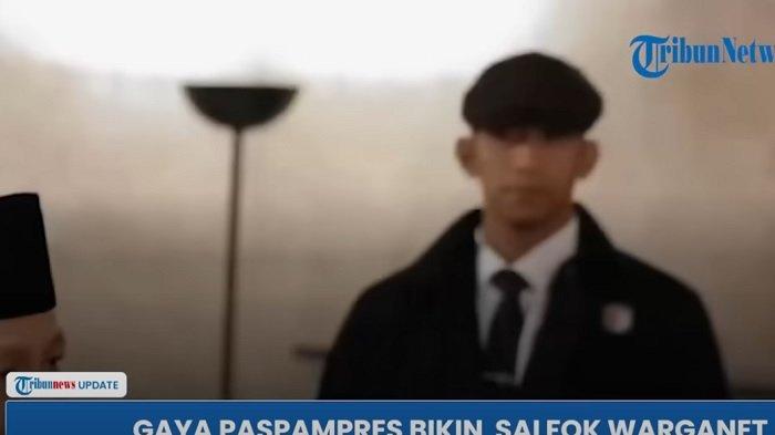 KOMANDAN DALI-Komandan Tim Pengamanan Pribadi Presiden dalam Pasukan Pengamanan Presiden (Paspampres), Kapten Inf Dali Darulqutni saat mendampingi Presiden RI, Prabowo Subianto kunjungan ke Inggris, beberapa waktu lalu. Penampilannya yang mengenakan mantel dan topi disebut-sebut mirip karakter dalam serial 
